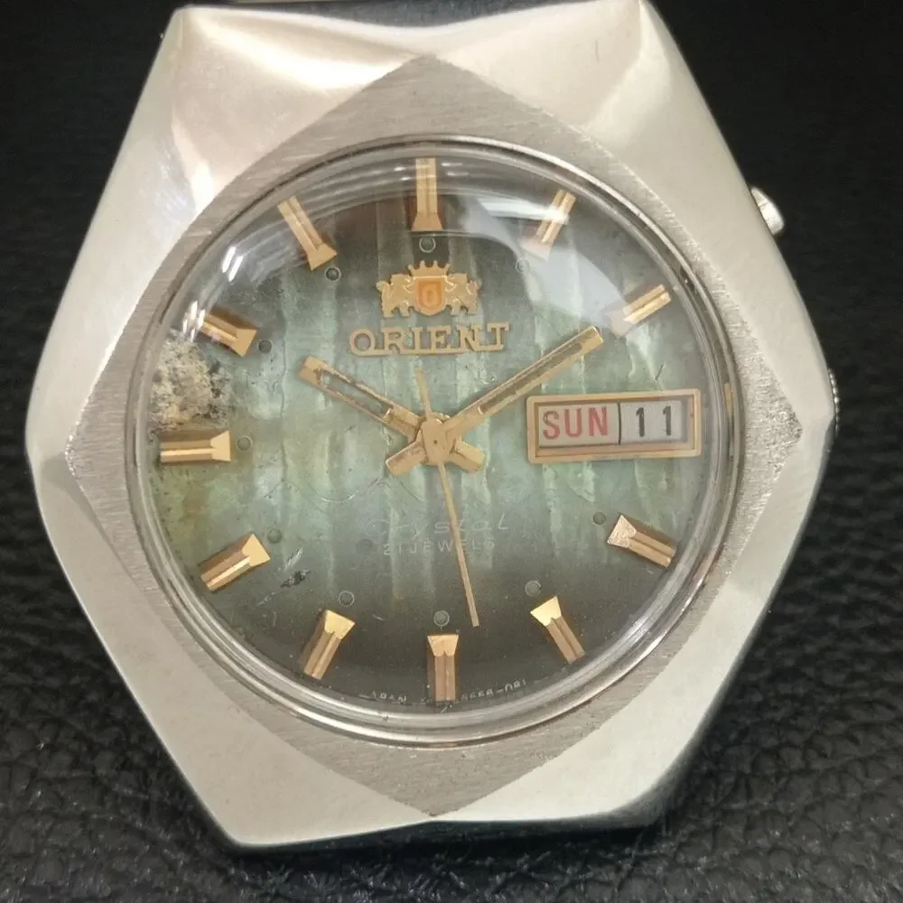 Vintage 1990 Orient Automatic Mens Silver Watch W/daydate & Green accents